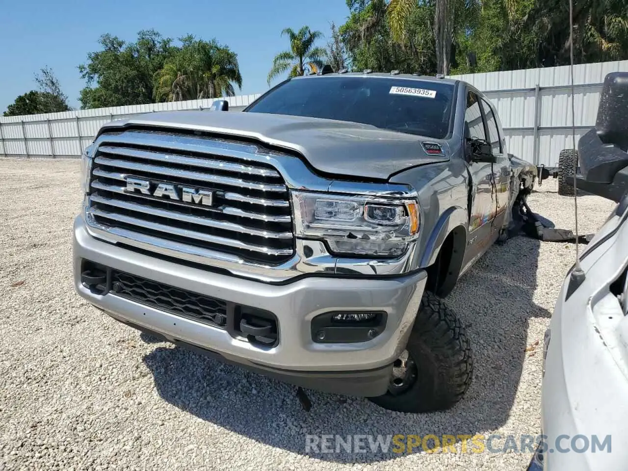 1 Photograph of a damaged car 3C63RRNL2PG623661 RAM 3500 2023