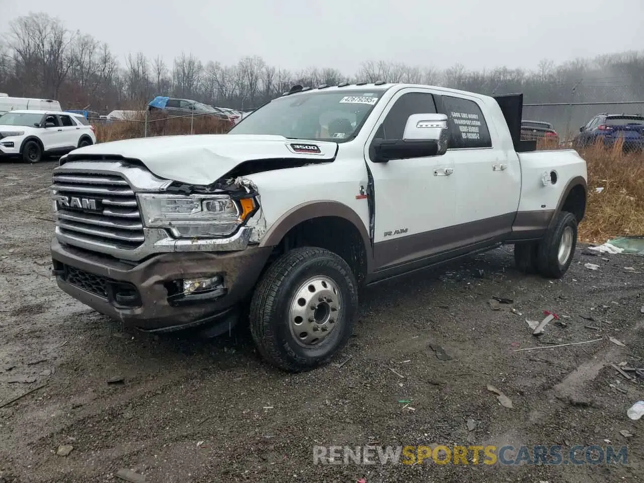 1 Photograph of a damaged car 3C63RRNL8PG623843 RAM 3500 2023