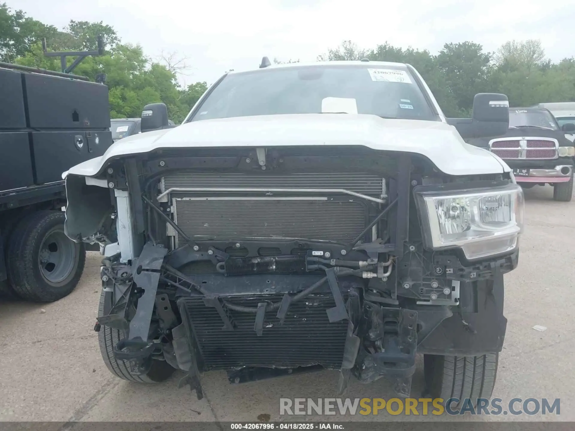 11 Photograph of a damaged car 3C63R3HL0RG358136 RAM 3500 2024