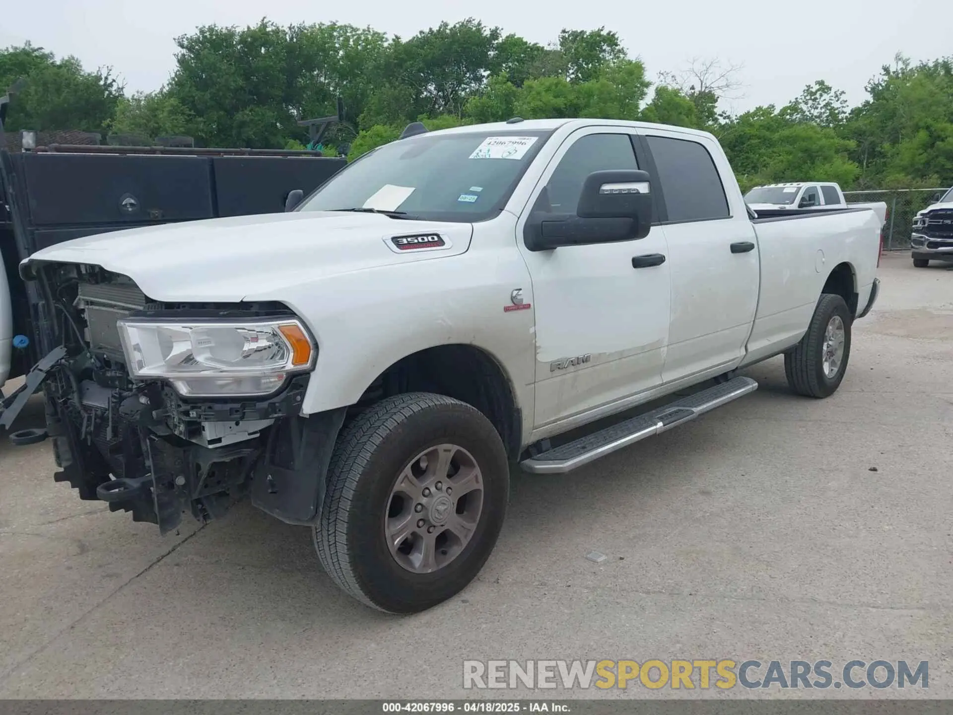 2 Photograph of a damaged car 3C63R3HL0RG358136 RAM 3500 2024