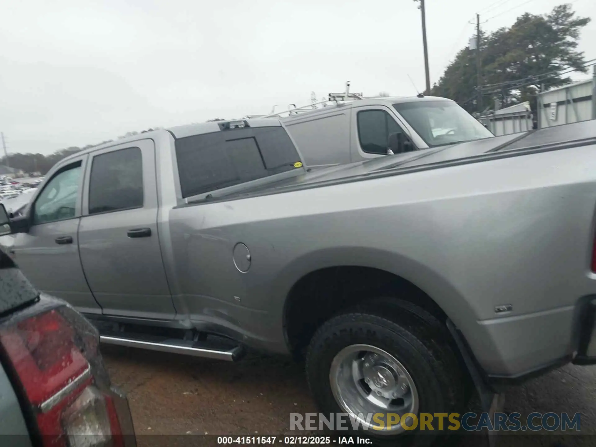 14 Photograph of a damaged car 3C63RRGL7RG360230 RAM 3500 2024