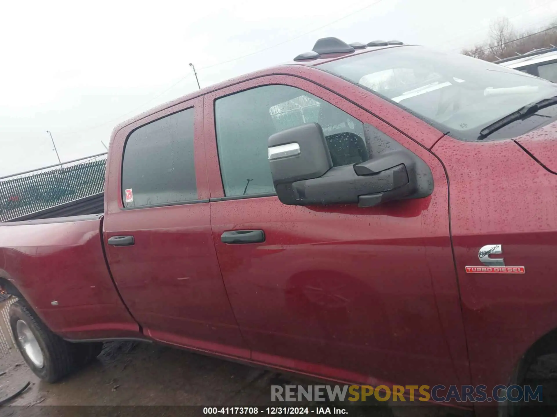 14 Photograph of a damaged car 3C63RRGL9RG295249 RAM 3500 2024