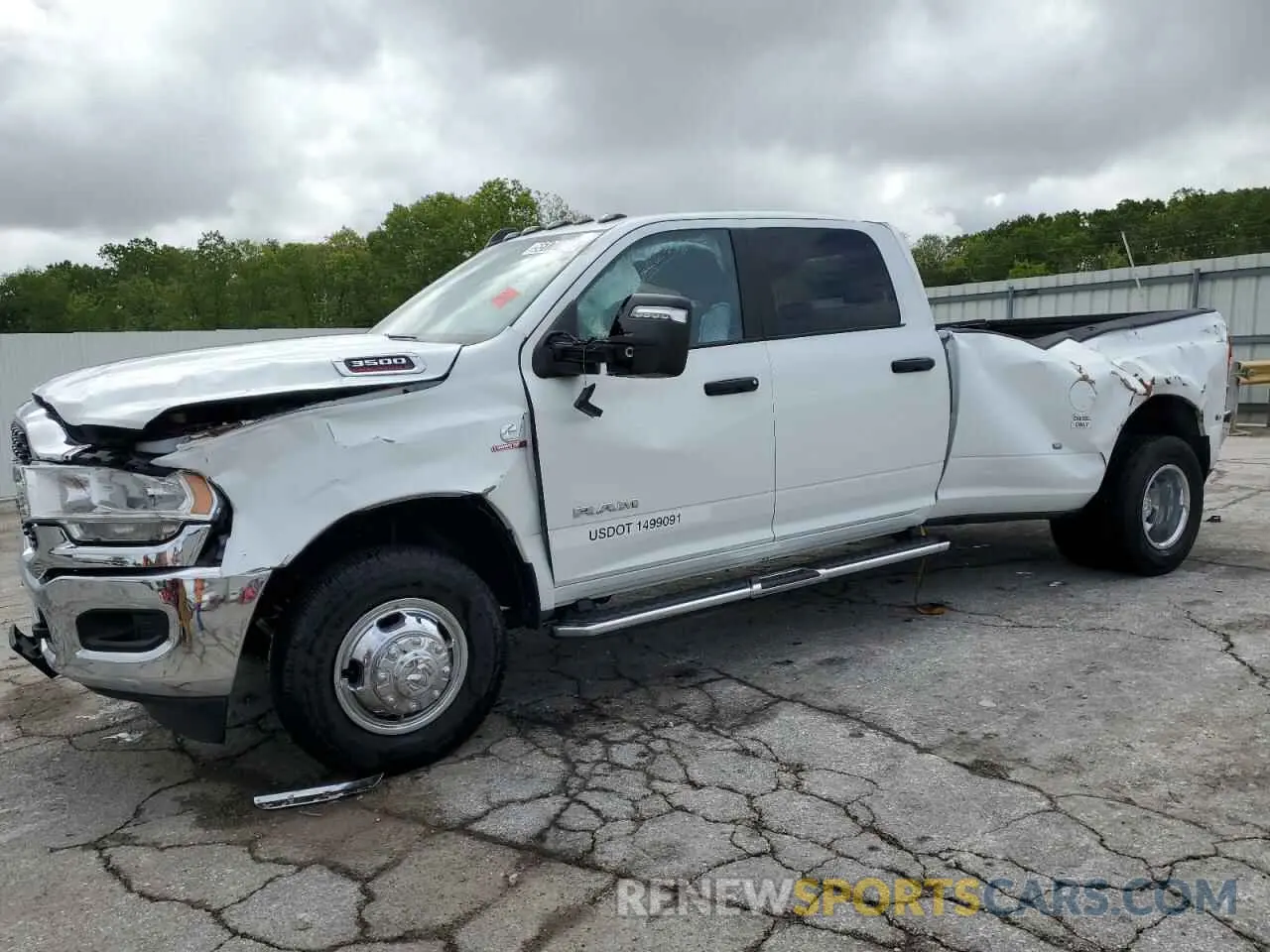 1 Photograph of a damaged car 3C63RRHL1RG271736 RAM 3500 2024