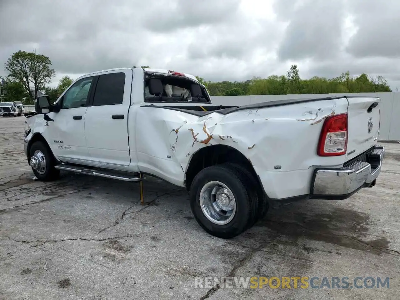 2 Photograph of a damaged car 3C63RRHL1RG271736 RAM 3500 2024