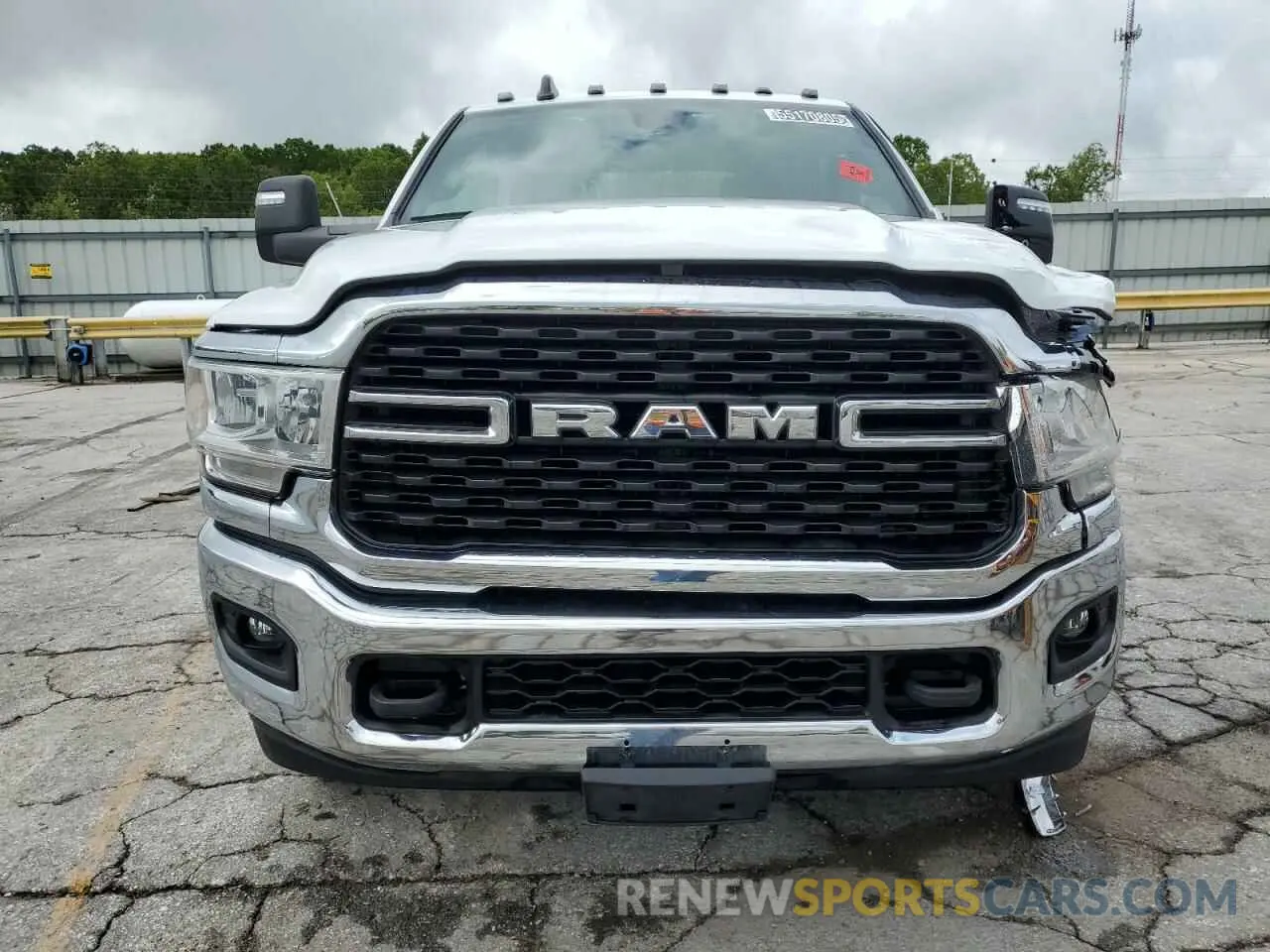 5 Photograph of a damaged car 3C63RRHL1RG271736 RAM 3500 2024