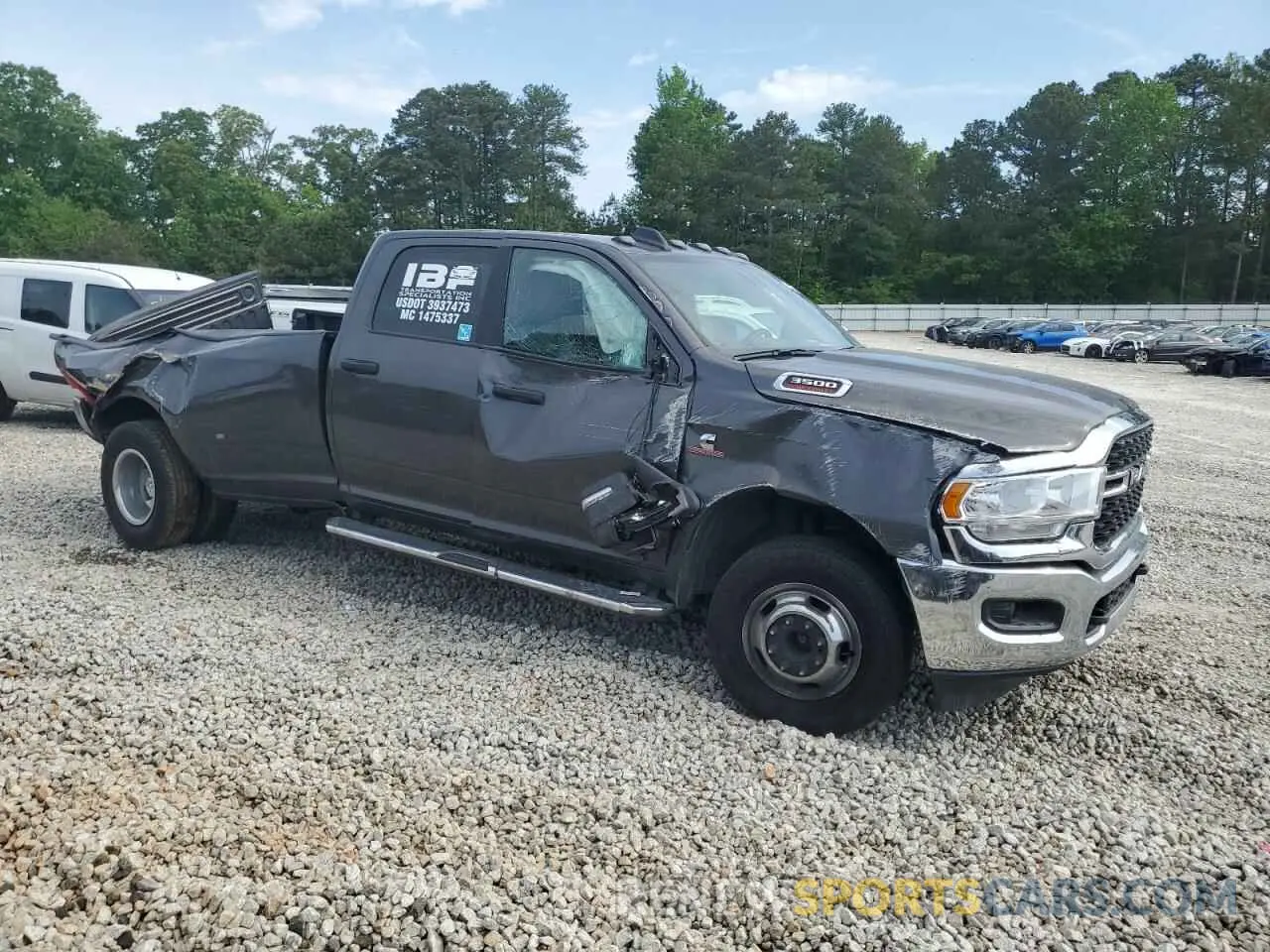 4 Photograph of a damaged car 3C63RRHL7RG360064 RAM 3500 2024