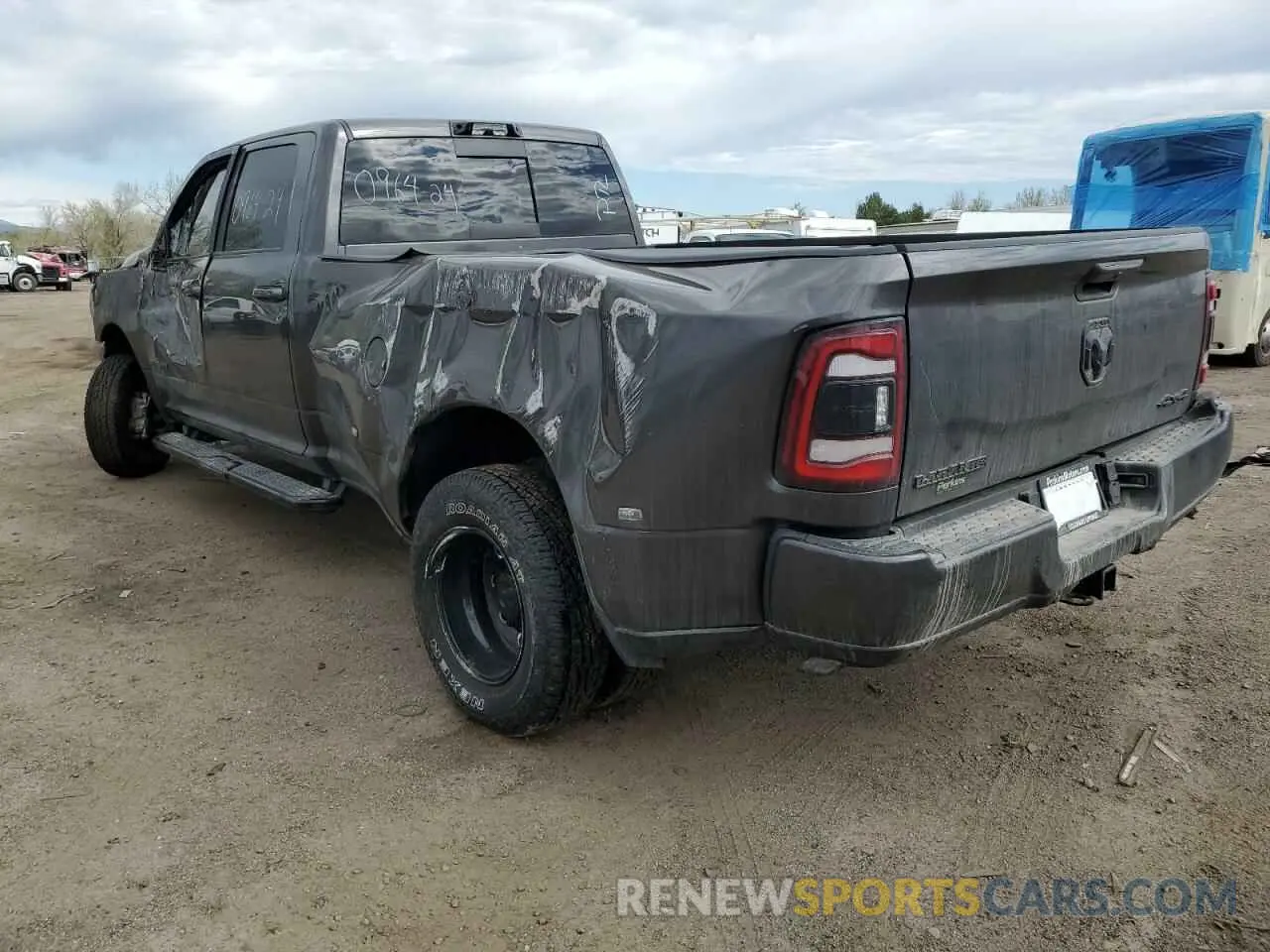2 Photograph of a damaged car 3C63RRJL3RG150085 RAM 3500 2024