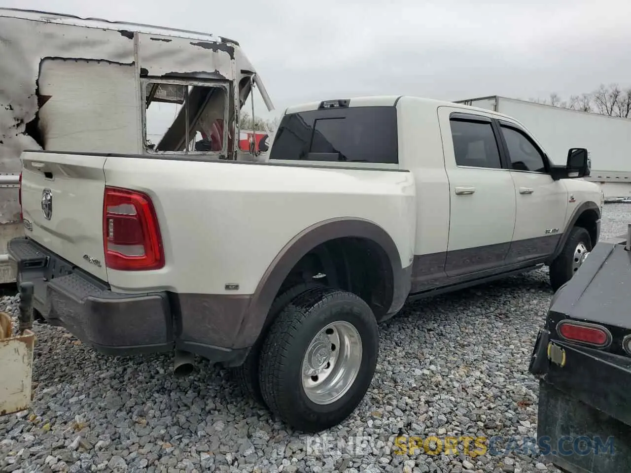 3 Photograph of a damaged car 3C63RRNL6RG112988 RAM 3500 2024