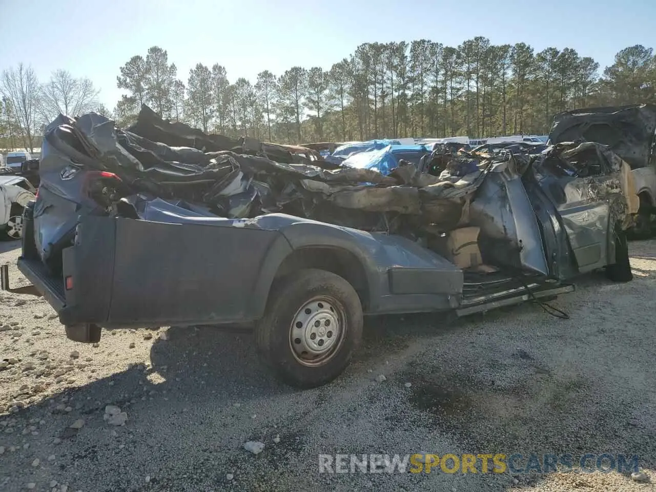 3 Photograph of a damaged car 3C6URVJG5KE546603 RAM All Models 2019