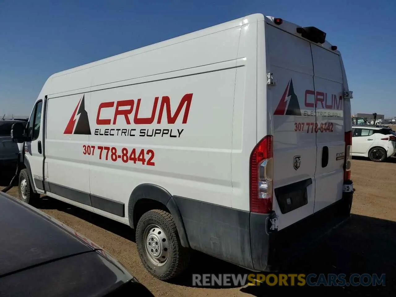 2 Photograph of a damaged car 3C6URVJG7KE501131 RAM All Models 2019