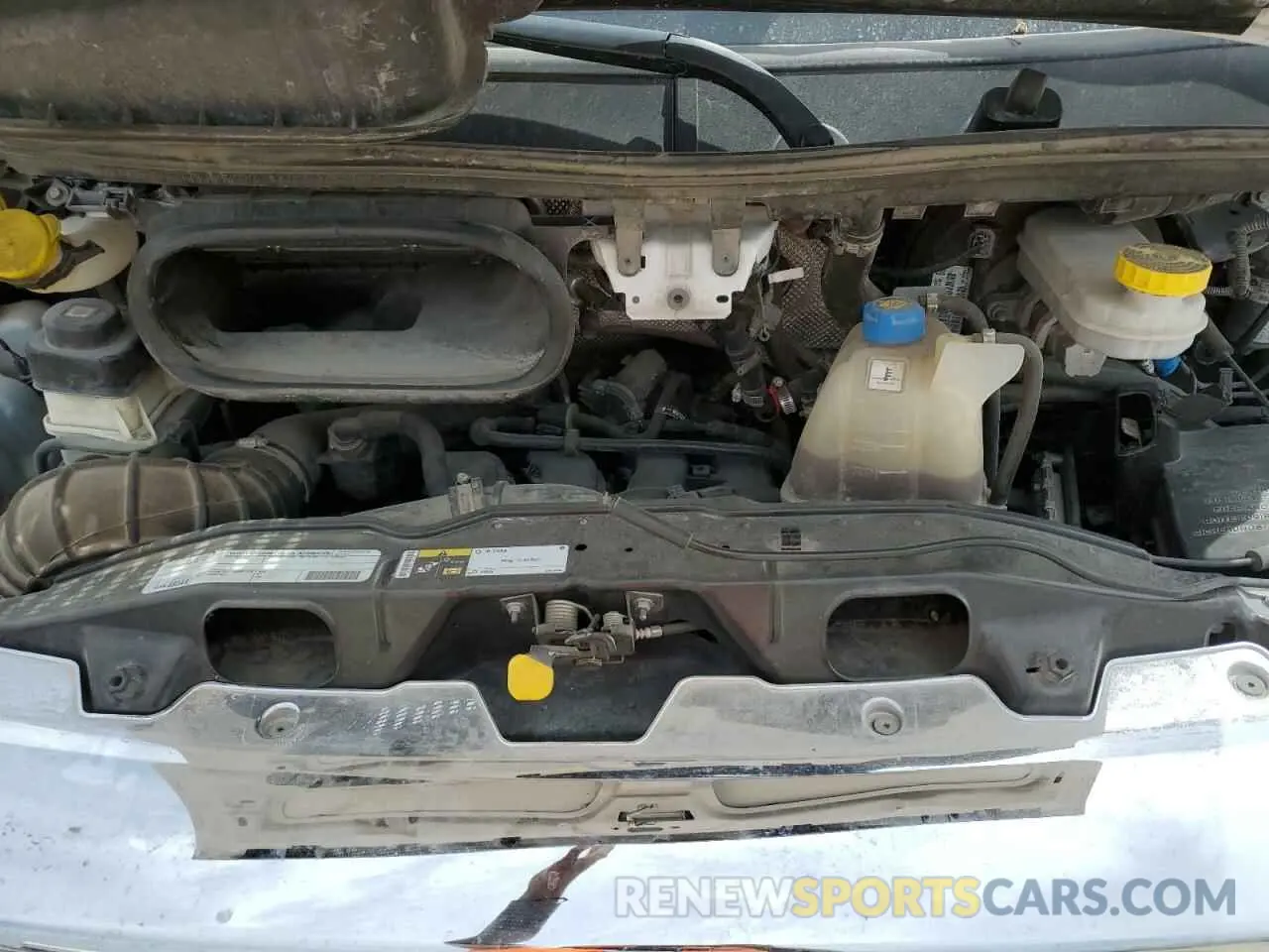 12 Photograph of a damaged car 3C6URVUG8KE560345 RAM All Models 2019