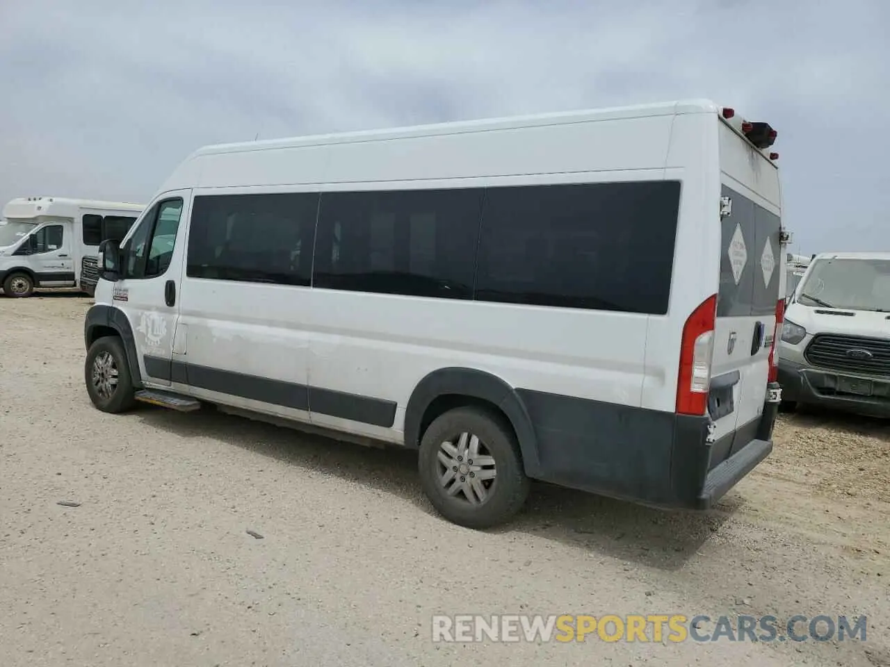 2 Photograph of a damaged car 3C6URVUG8KE560345 RAM All Models 2019