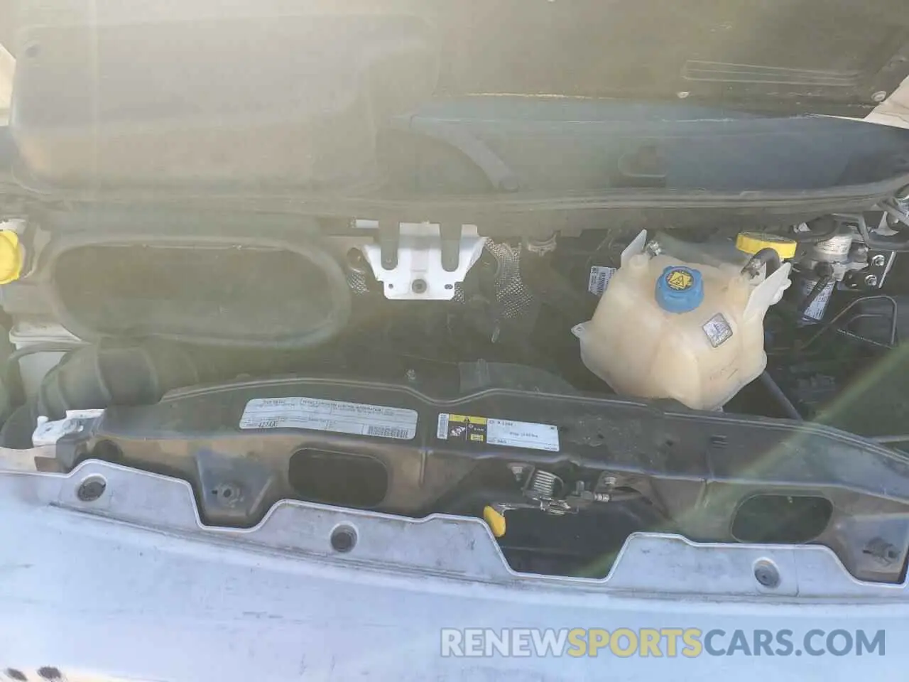 13 Photograph of a damaged car 3C6TRVBG5LE104562 RAM All Models 2020