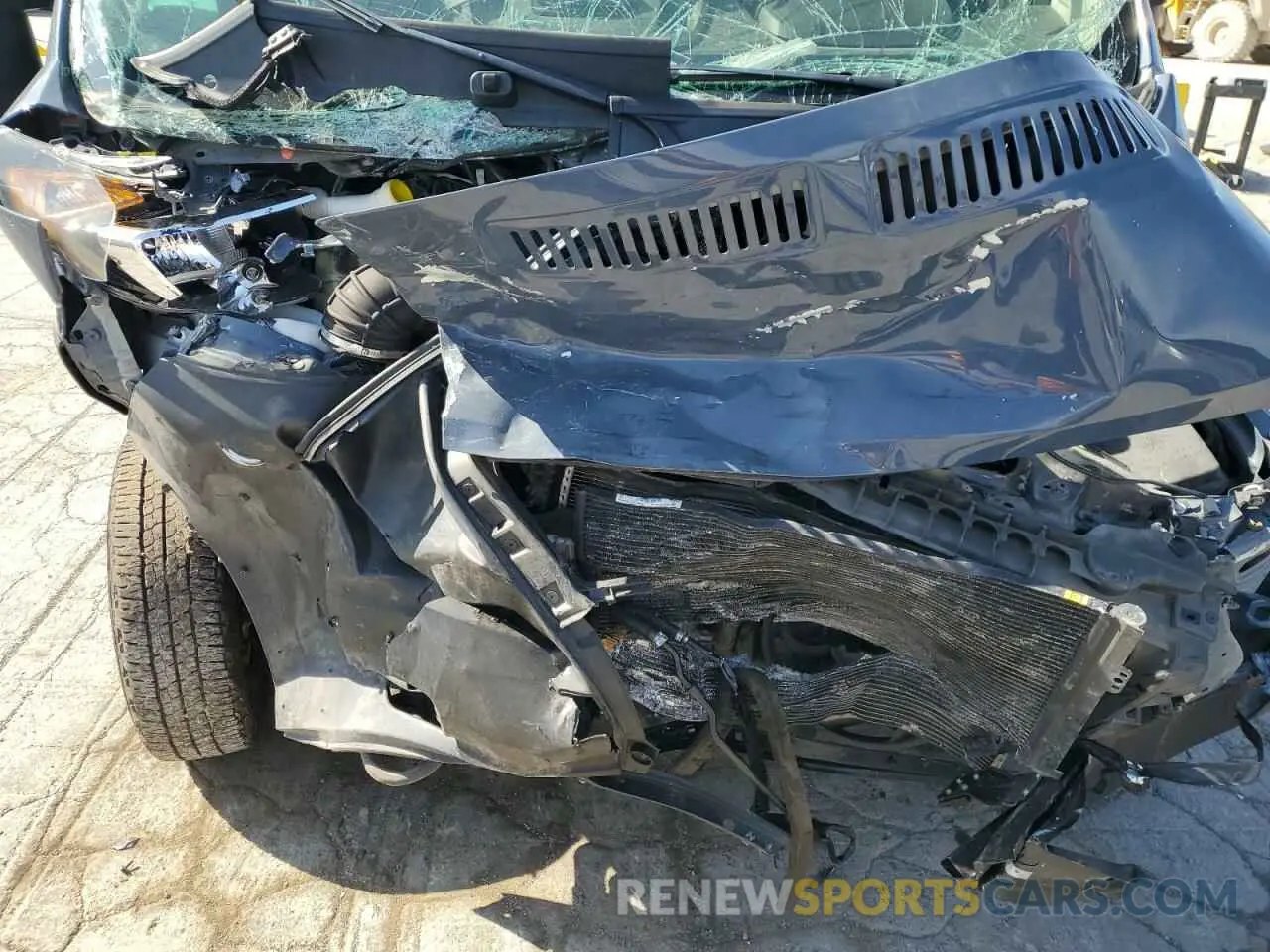 12 Photograph of a damaged car 3C6MRVJG5ME571875 RAM All Models 2021