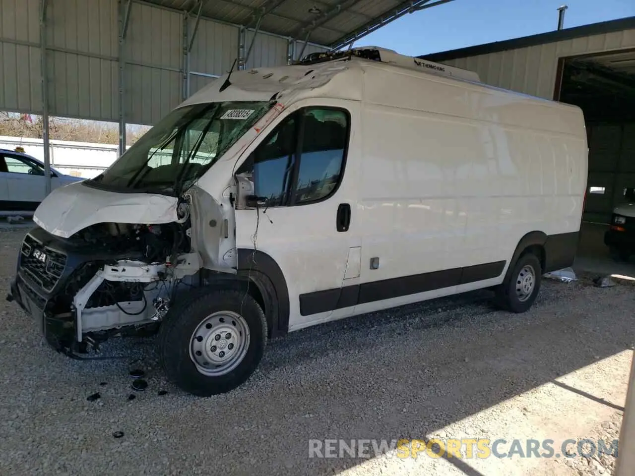 1 Photograph of a damaged car 3C6MRVJG7PE508698 RAM All Models 2023