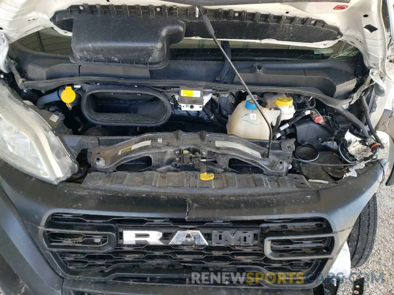 12 Photograph of a damaged car 3C6MRVJG7PE508698 RAM All Models 2023