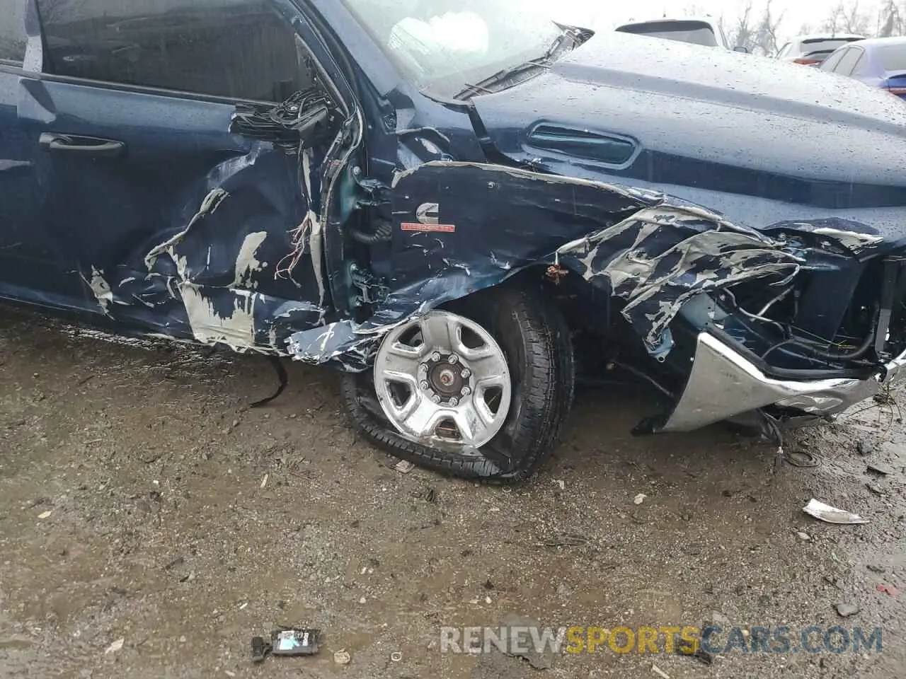 9 Photograph of a damaged car 3C6UR5HL0RG169082 RAM All Models 2024
