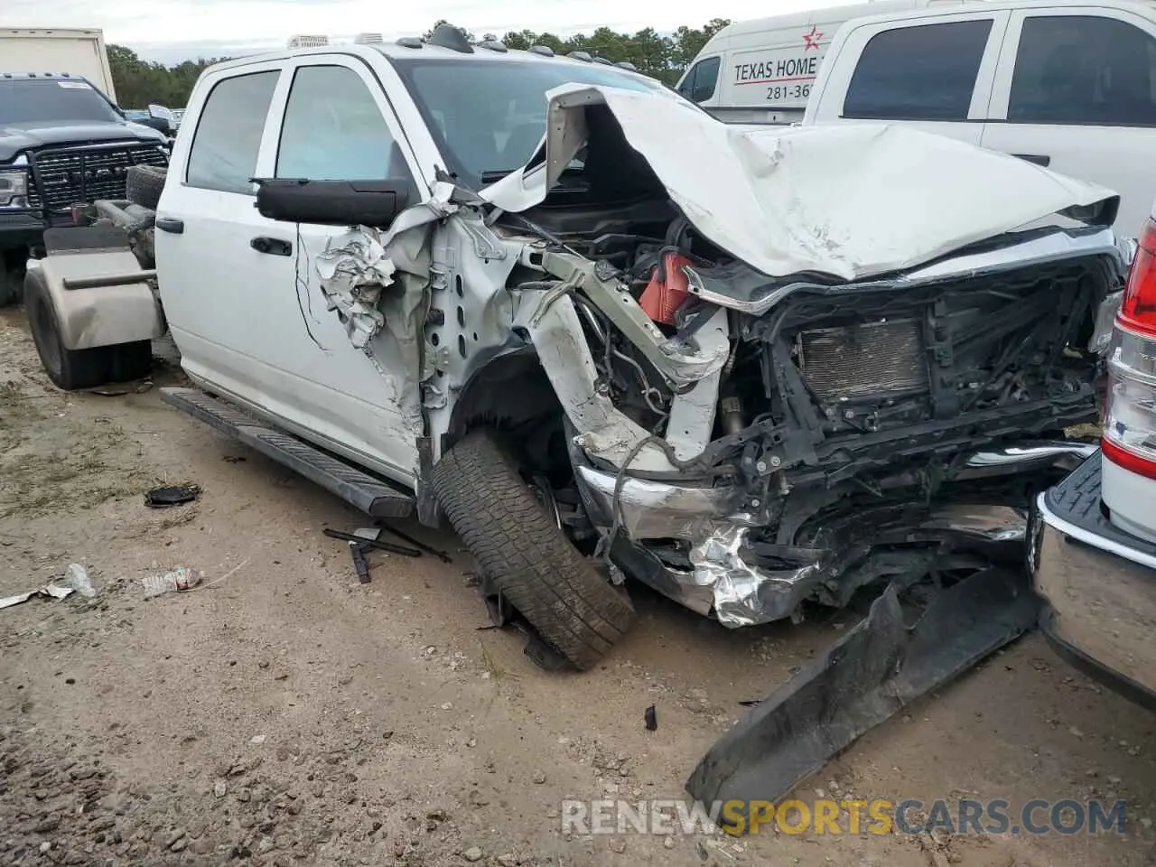 4 Photograph of a damaged car 3C7WRTCL3RG152843 RAM All Models 2024
