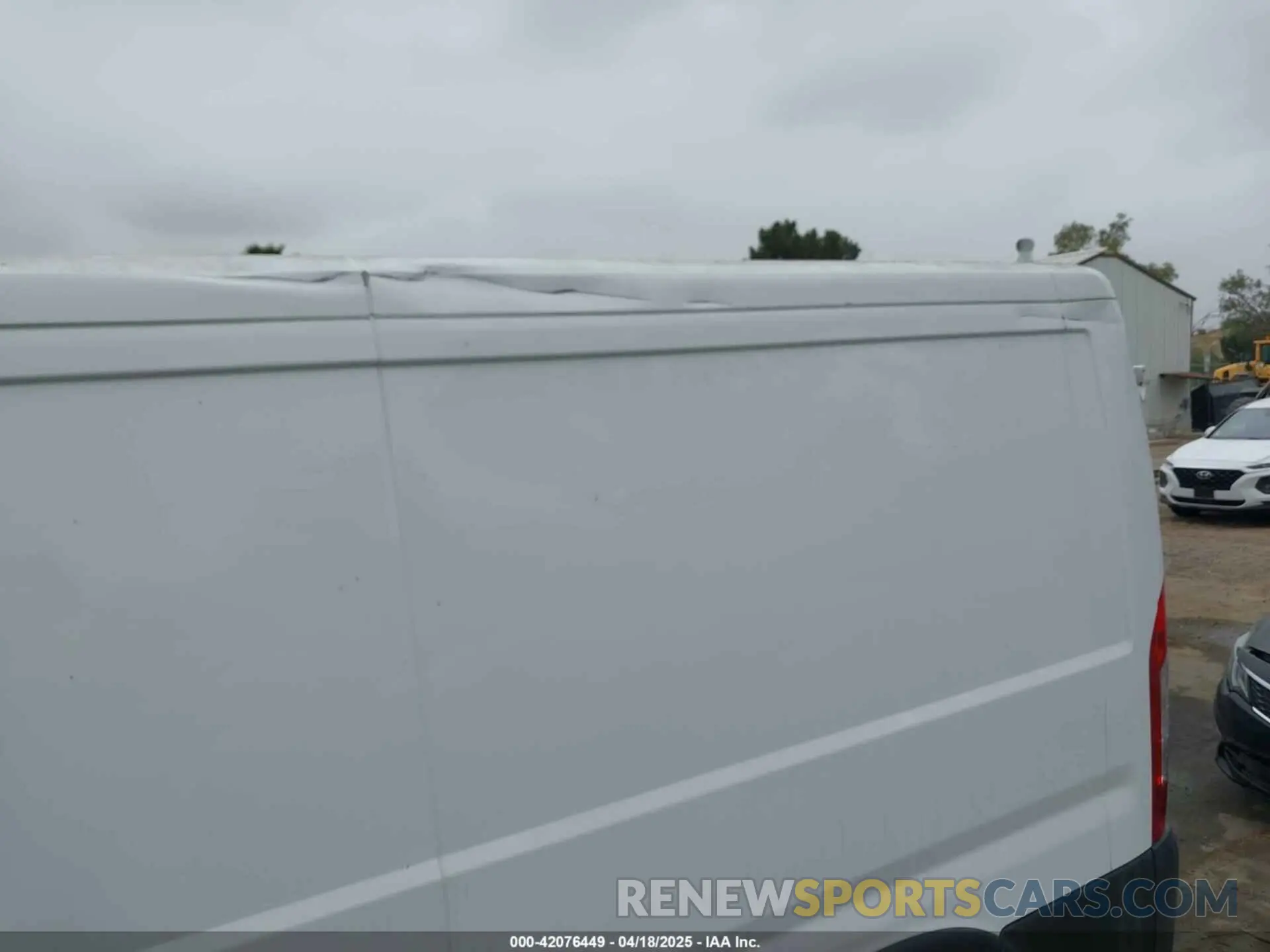11 Photograph of a damaged car 3C6TRVAG0KE525704 RAM PROMASTER 1500 2019