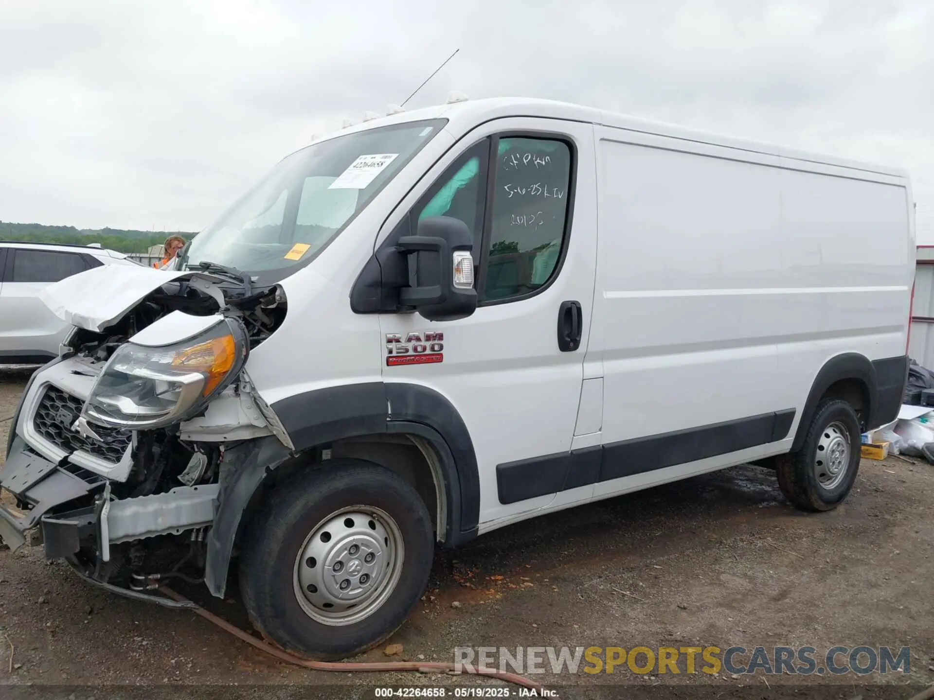 14 Photograph of a damaged car 3C6TRVAG9KE538970 RAM PROMASTER 1500 2019
