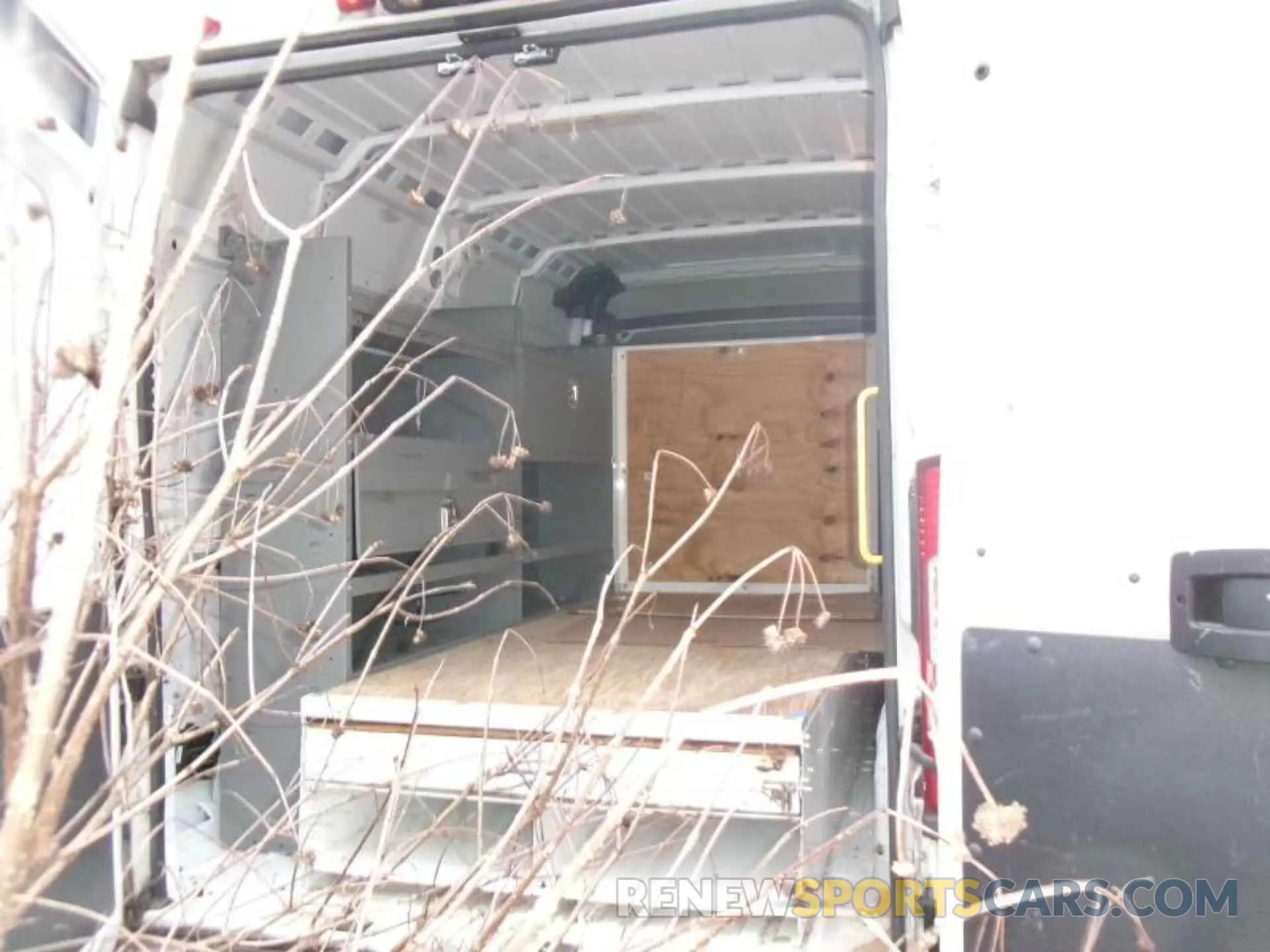 14 Photograph of a damaged car 3C6TRVBG7KE559248 RAM PROMASTER 1500 2019