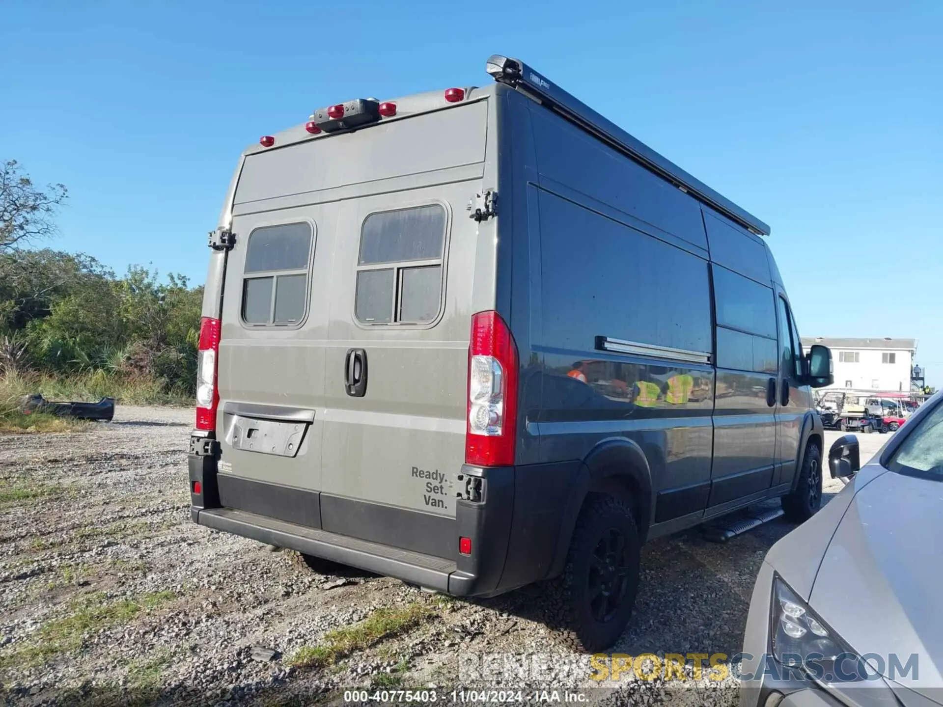 4 Photograph of a damaged car 3C6MRVHG0PE574838 RAM PROMASTER 3500 2023