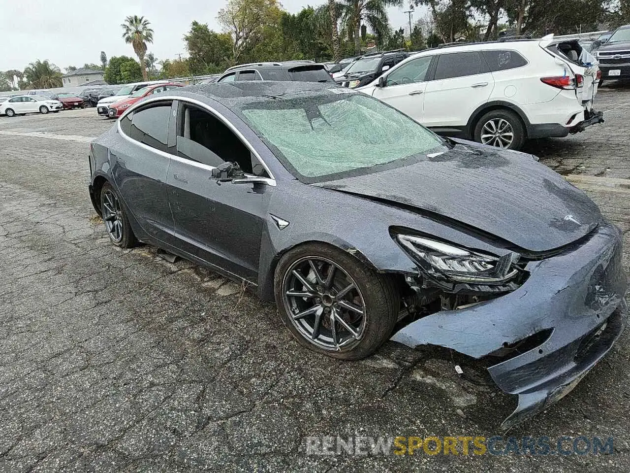 4 Photograph of a damaged car 5YJ3E1EA4KF407409 TESLA MODEL 3 2019