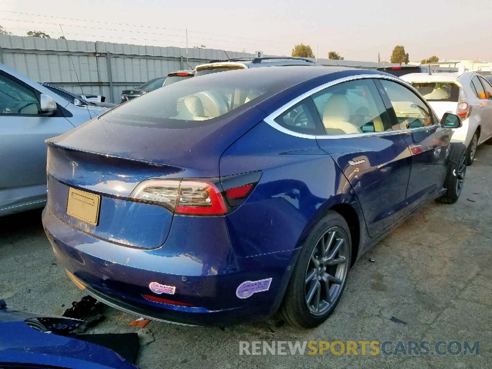4 Photograph of a damaged car 5YJ3E1EA6KF302015 TESLA MODEL 3 2019