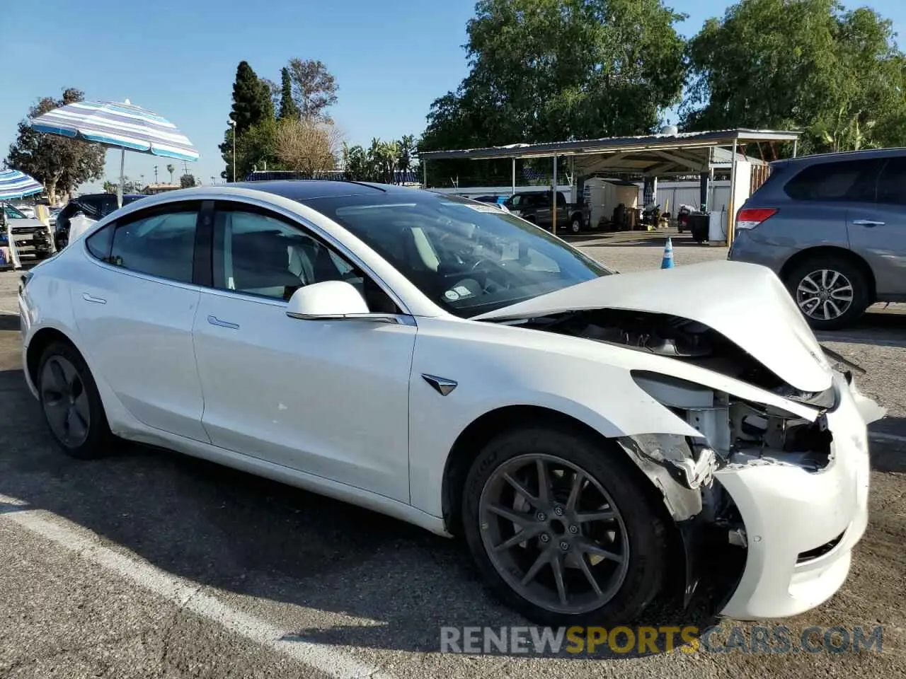 4 Фотография поврежденного автомобиля 5YJ3E1EA7KF300175 TESLA MODEL 3 2019