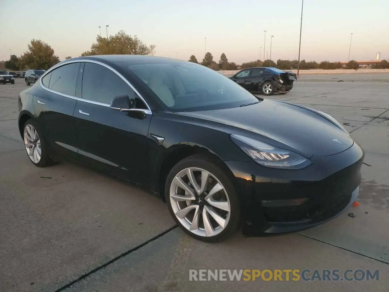 4 Photograph of a damaged car 5YJ3E1EAXKF323790 TESLA MODEL 3 2019