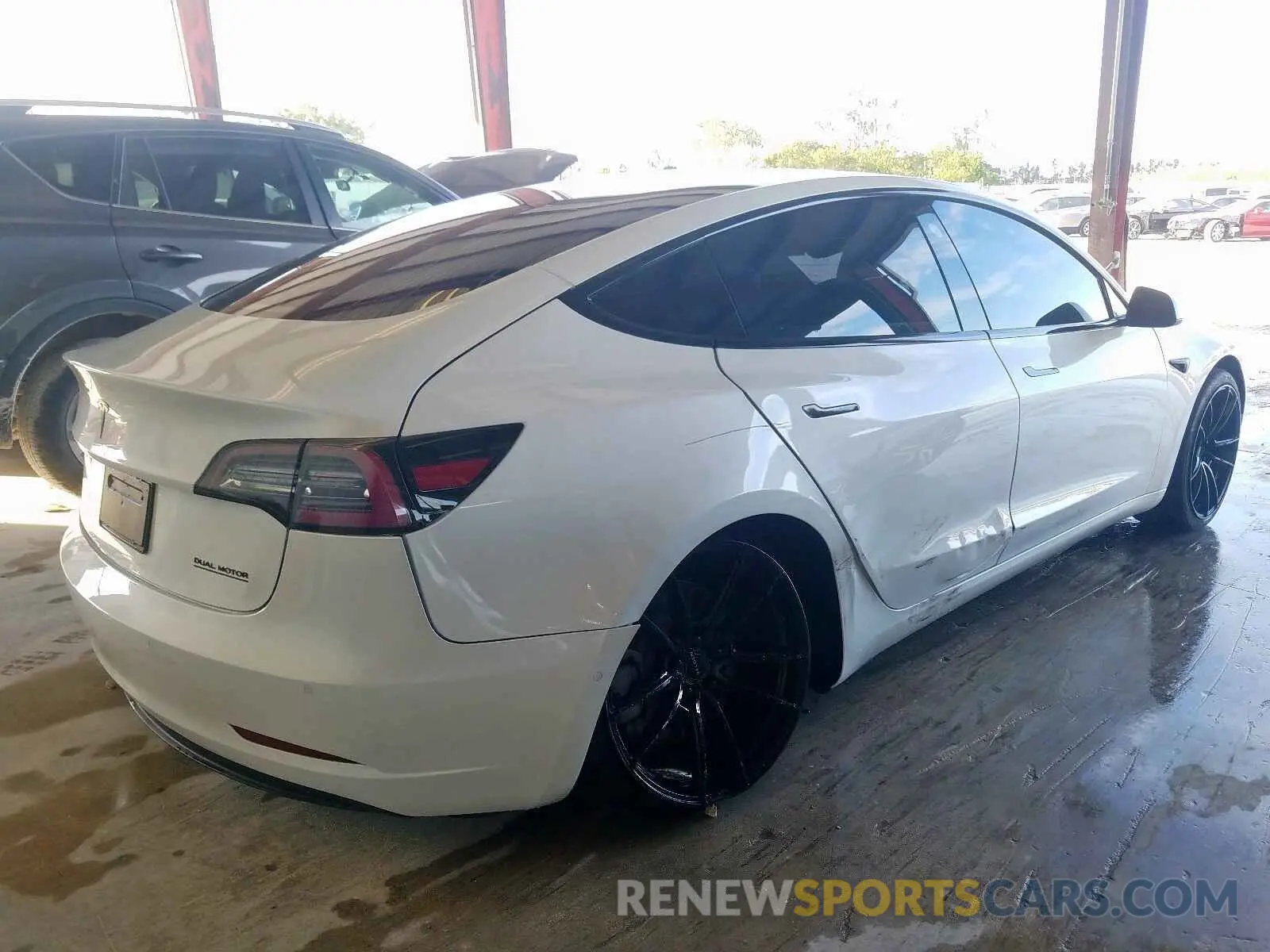 4 Photograph of a damaged car 5YJ3E1EB0KF418383 TESLA MODEL 3 2019