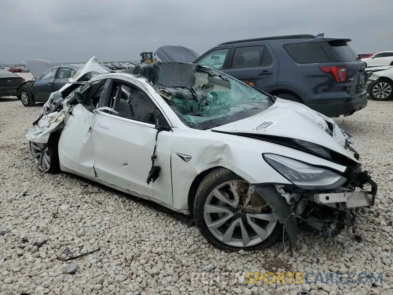 4 Photograph of a damaged car 5YJ3E1EB2KF513401 TESLA MODEL 3 2019