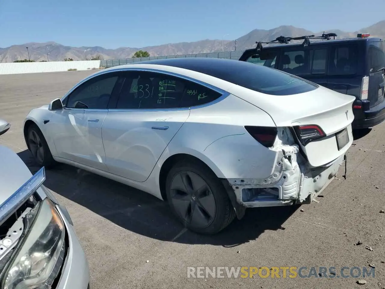 2 Photograph of a damaged car 5YJ3E1EB3KF493840 TESLA MODEL 3 2019