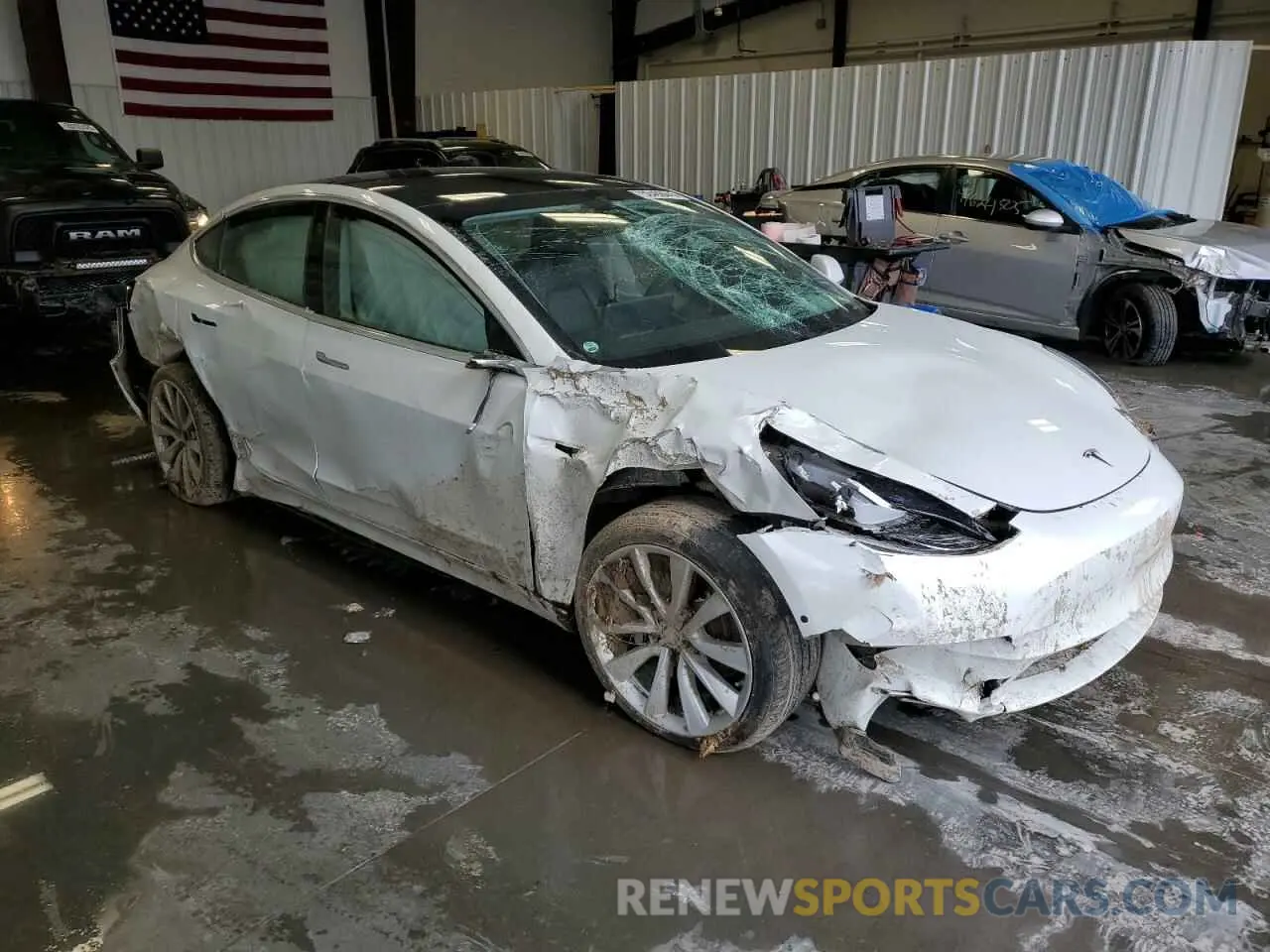 4 Photograph of a damaged car 5YJ3E1EB3KF494292 TESLA MODEL 3 2019