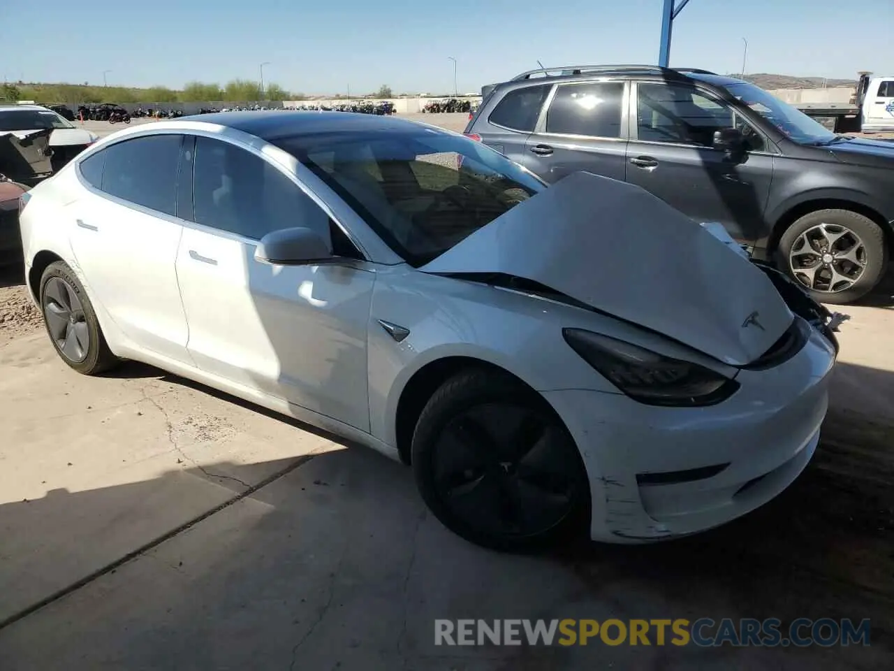 4 Photograph of a damaged car 5YJ3E1EB3KF513035 TESLA MODEL 3 2019