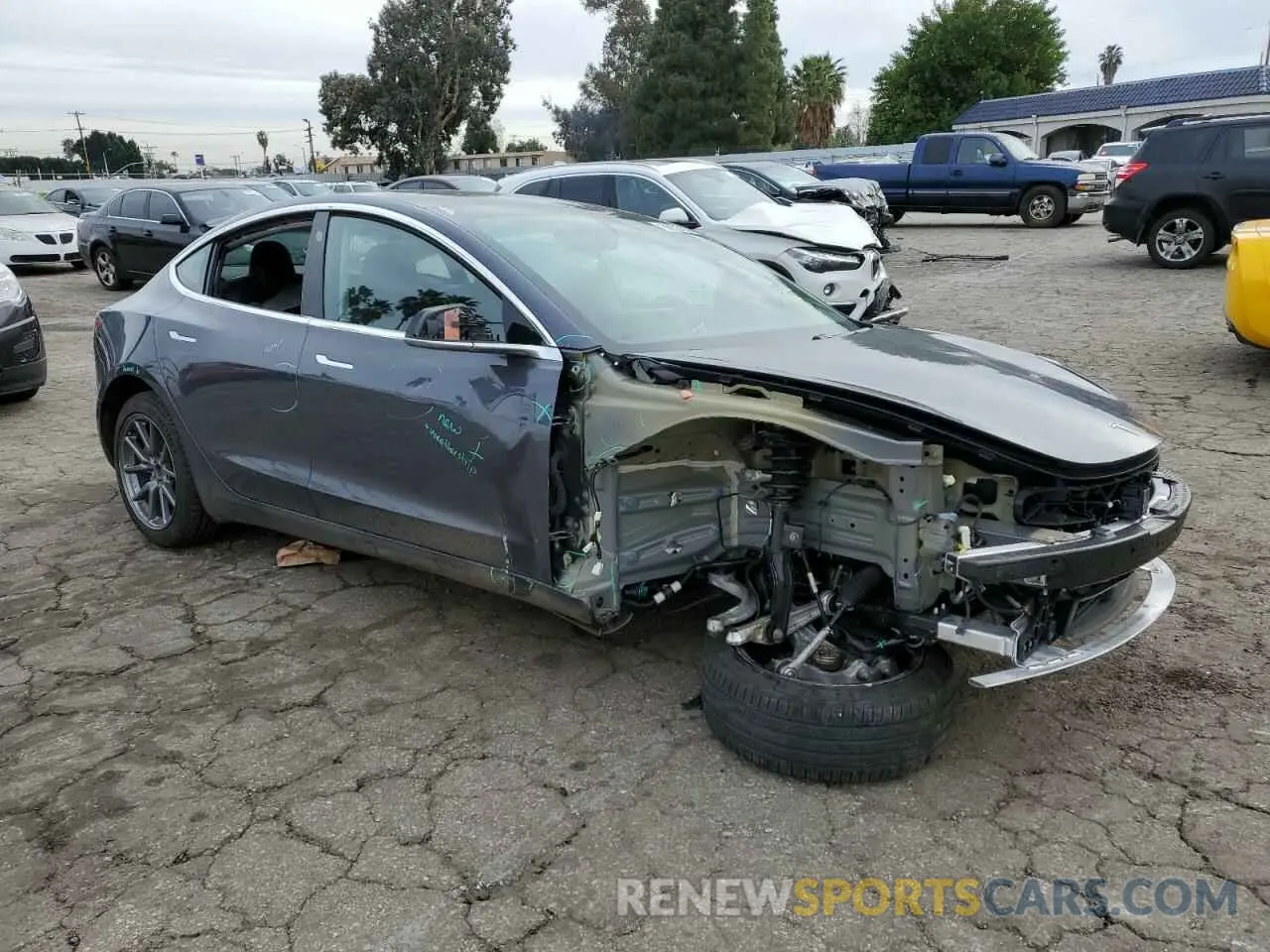4 Photograph of a damaged car 5YJ3E1EB4KF386697 TESLA MODEL 3 2019