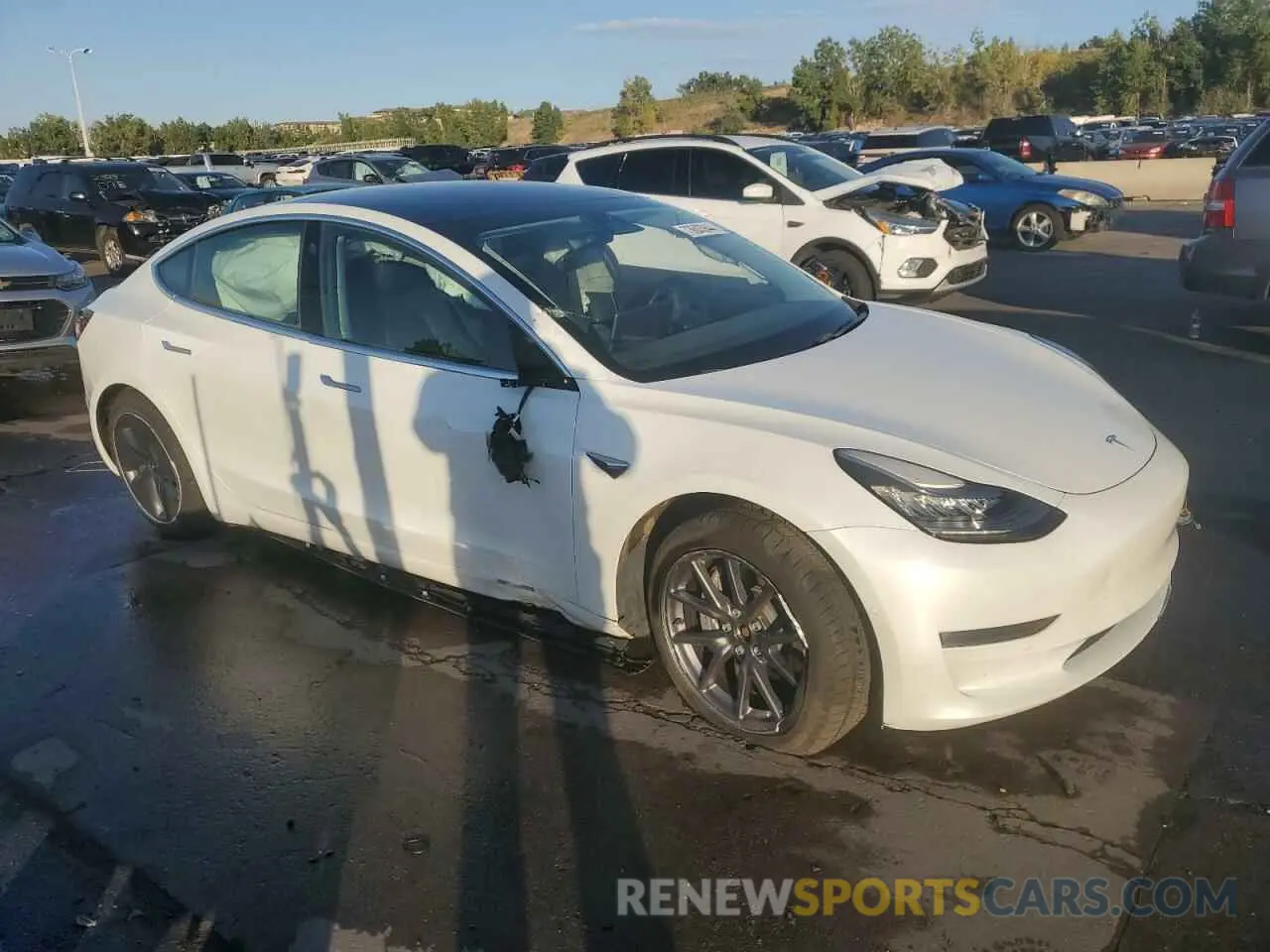 4 Photograph of a damaged car 5YJ3E1EB7KF442339 TESLA MODEL 3 2019
