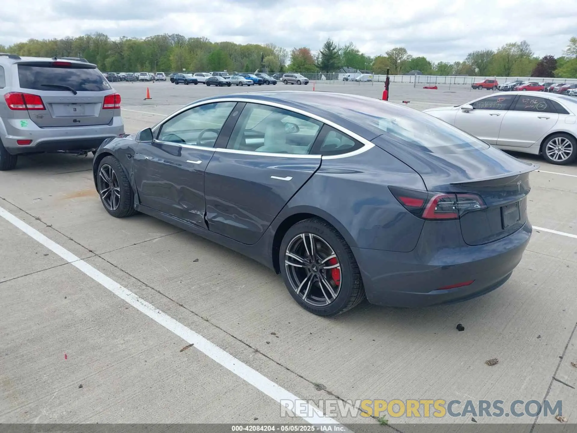 3 Photograph of a damaged car 5YJ3E1EB9KF230493 TESLA MODEL 3 2019