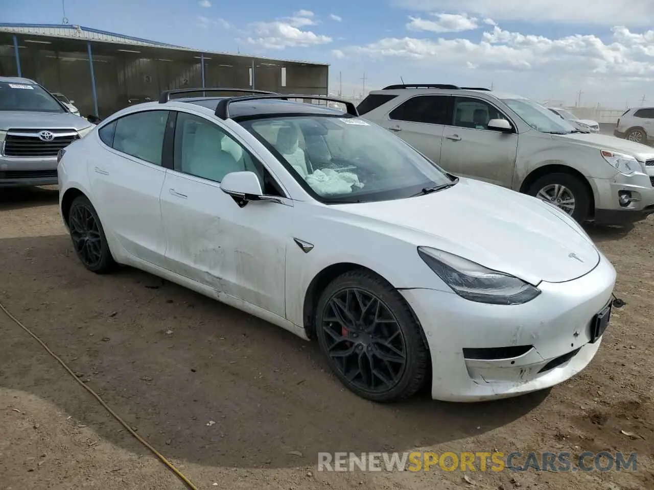 4 Photograph of a damaged car 5YJ3E1EB9KF423193 TESLA MODEL 3 2019