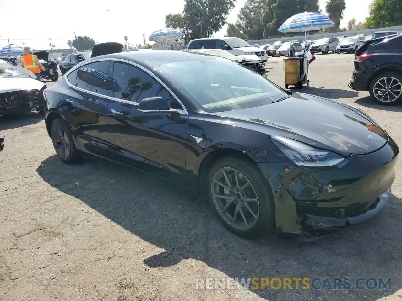 4 Photograph of a damaged car 5YJ3E1EA0LF802155 TESLA MODEL 3 2020
