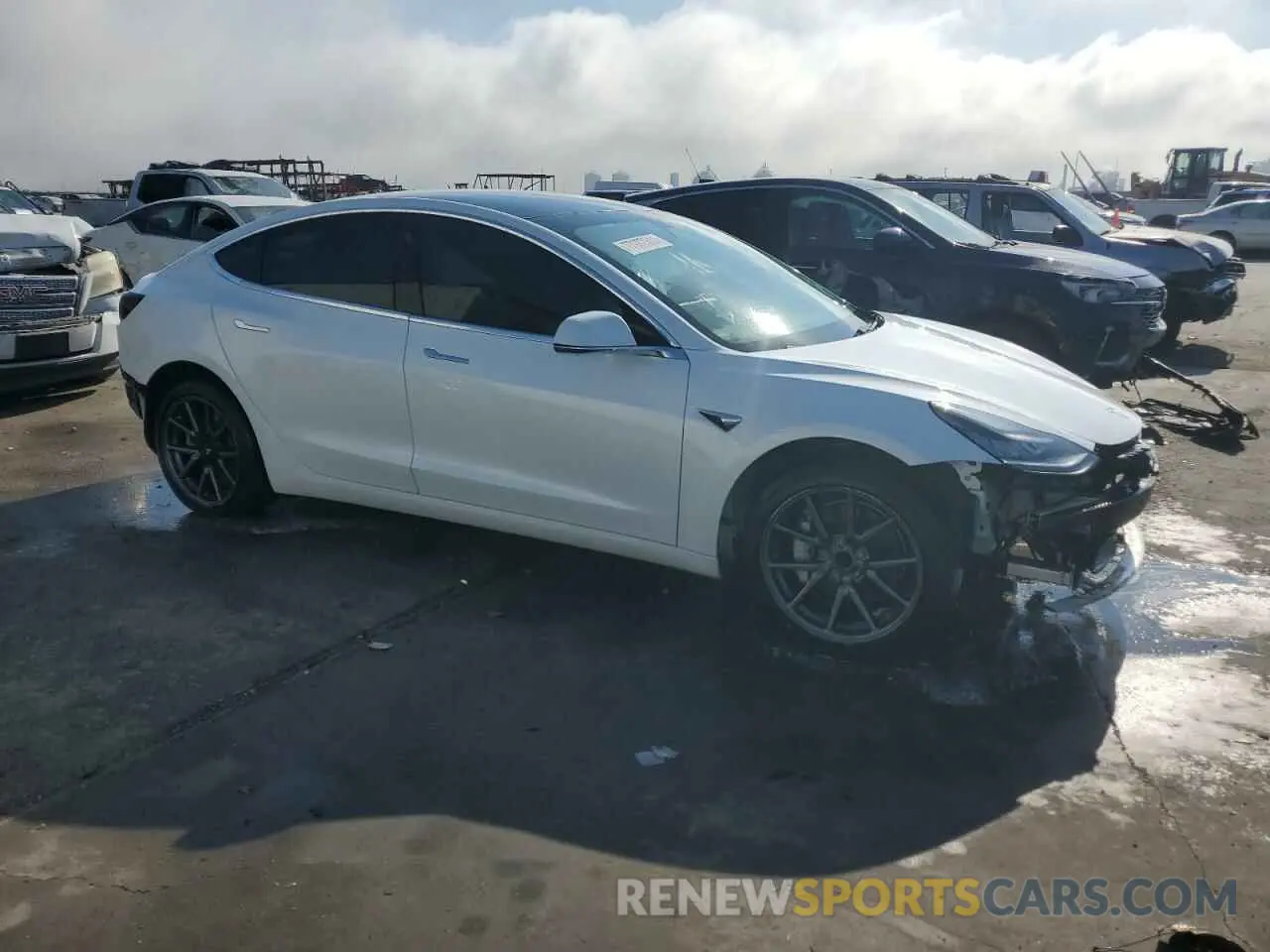 4 Photograph of a damaged car 5YJ3E1EA1LF598059 TESLA MODEL 3 2020