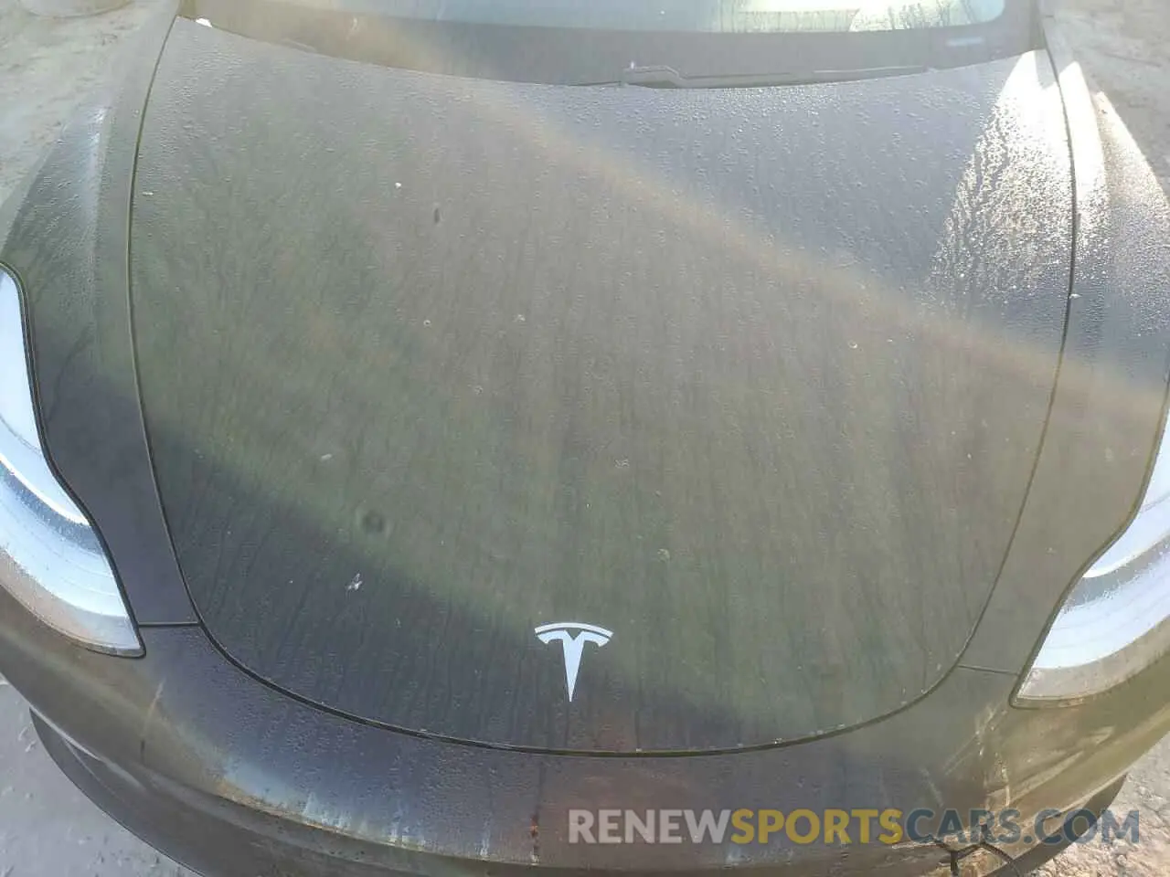 12 Photograph of a damaged car 5YJ3E1EA1LF643873 TESLA MODEL 3 2020