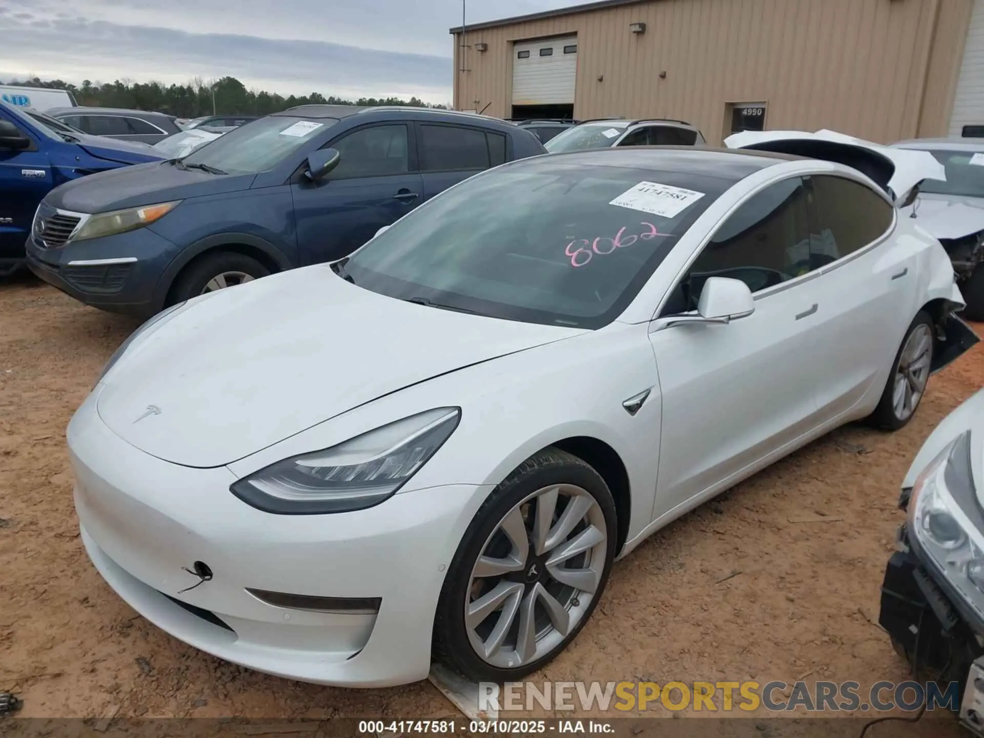 2 Photograph of a damaged car 5YJ3E1EA1LF738062 TESLA MODEL 3 2020