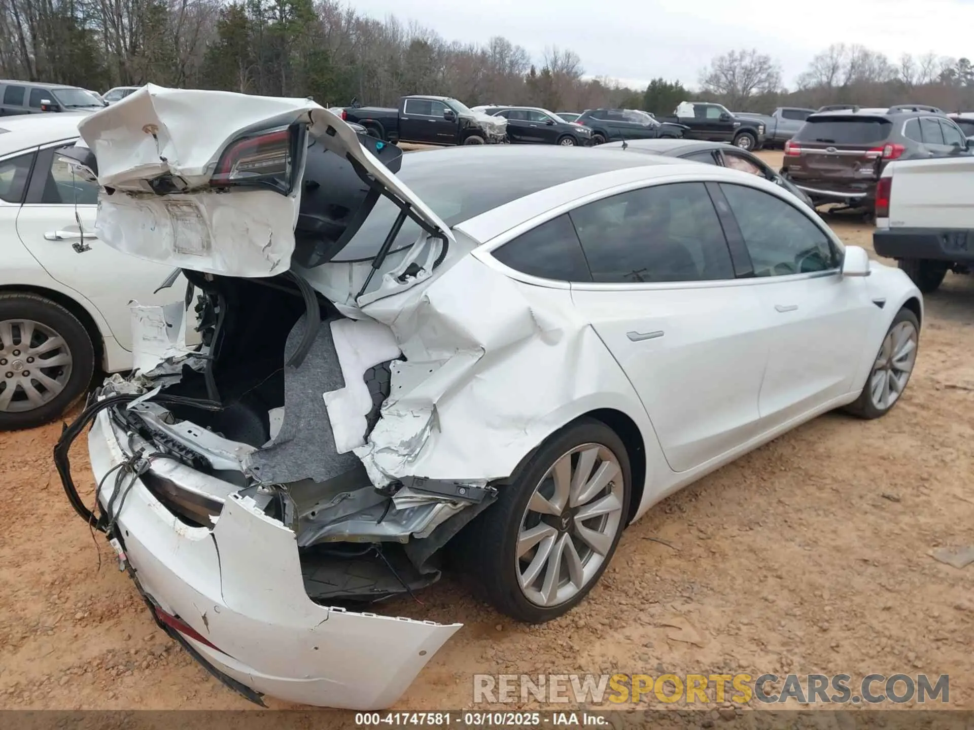 4 Photograph of a damaged car 5YJ3E1EA1LF738062 TESLA MODEL 3 2020