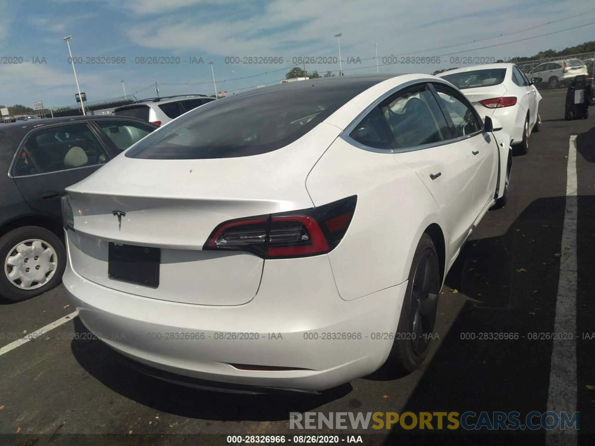 4 Photograph of a damaged car 5YJ3E1EA1LF745383 TESLA MODEL 3 2020