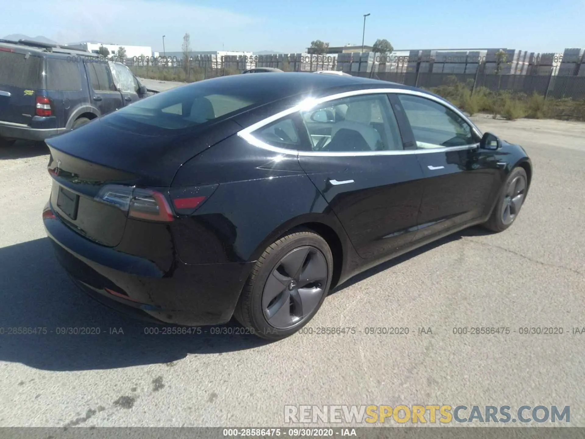 4 Photograph of a damaged car 5YJ3E1EA1LF745965 TESLA MODEL 3 2020