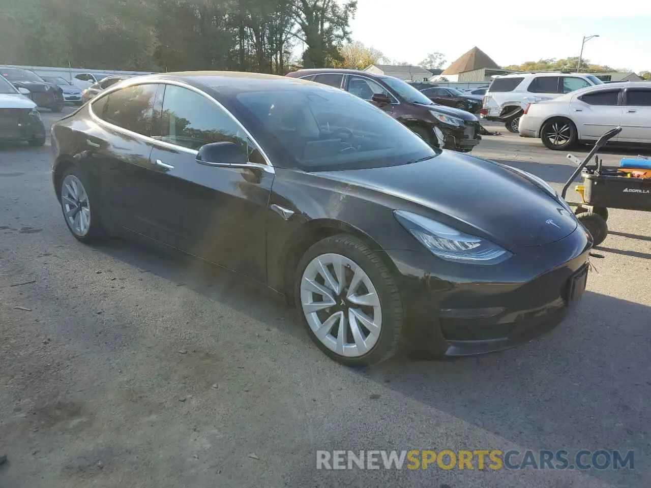4 Photograph of a damaged car 5YJ3E1EA1LF792218 TESLA MODEL 3 2020