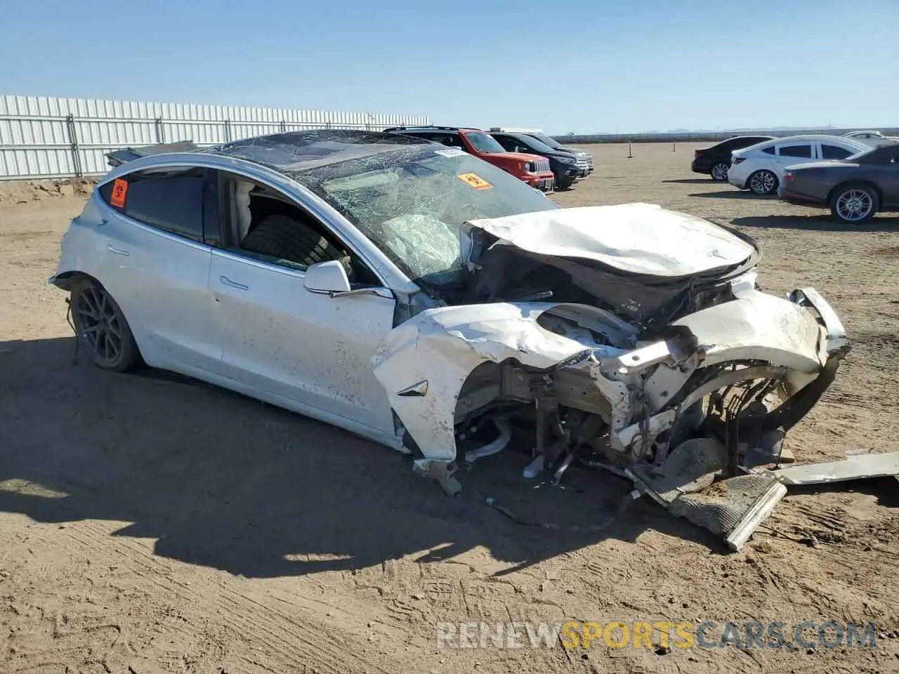 4 Photograph of a damaged car 5YJ3E1EA2LF633241 TESLA MODEL 3 2020