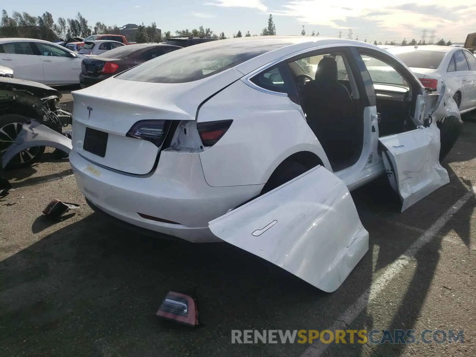 4 Photograph of a damaged car 5YJ3E1EA2LF644885 TESLA MODEL 3 2020