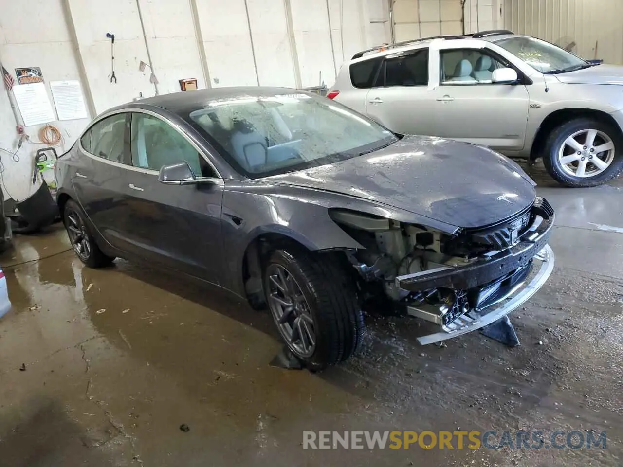 4 Photograph of a damaged car 5YJ3E1EA2LF658124 TESLA MODEL 3 2020